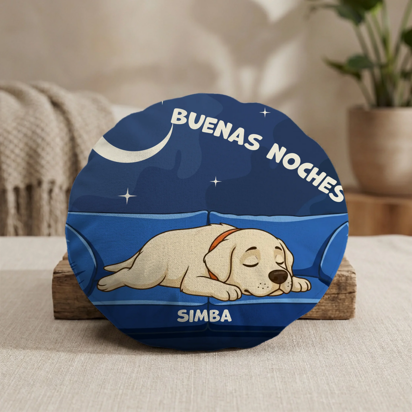 Cojín redondo "Buenas Noches" personalizado con retrato de perro durmiendo en sofá azul.