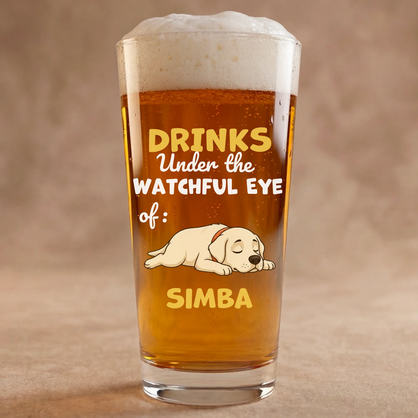 Personalized beer glass with a sleeping Labrador puppy and "Drinks Under the Watchful Eye of" slogan.