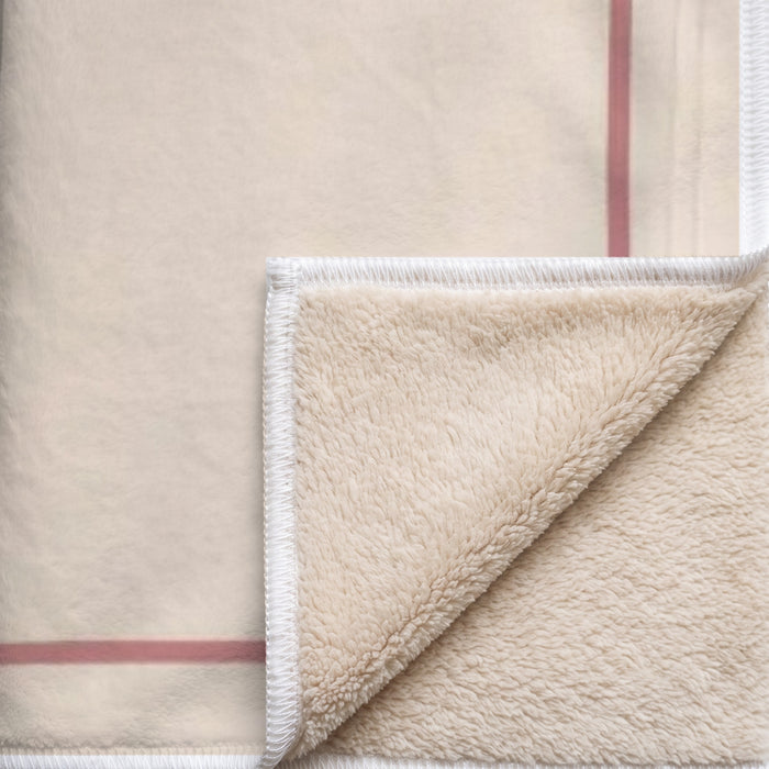 Coin replié du plaid Sieste avec lui : endroit imprimé, envers sherpa beige tout doux