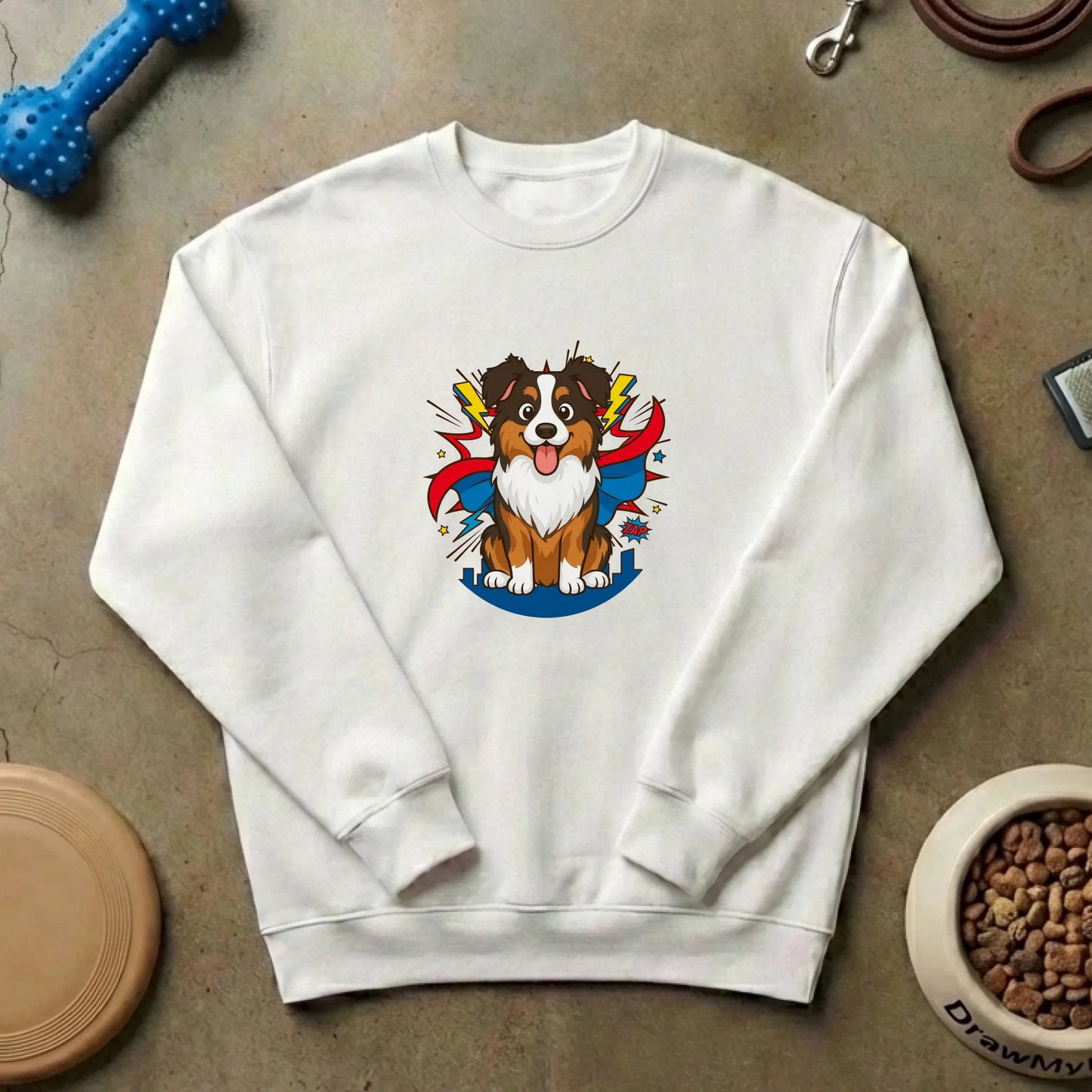 Pull blanc personnalisé avec portrait de chien super-héros et prénom de l'animal Draw My Pets.