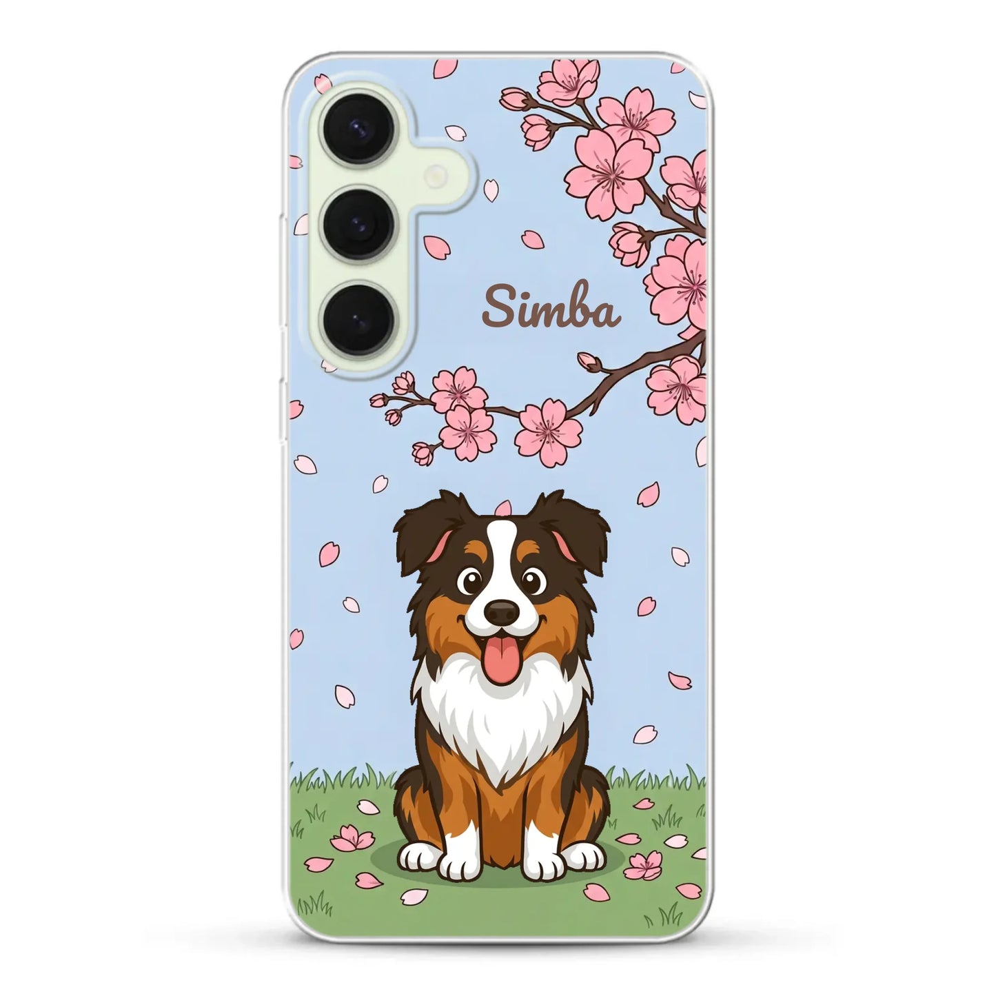 Stijlvolle close-up van een telefoonhoesje met het vrolijke hondenportret en de bloeiende Japanse lentebloesems op gras.