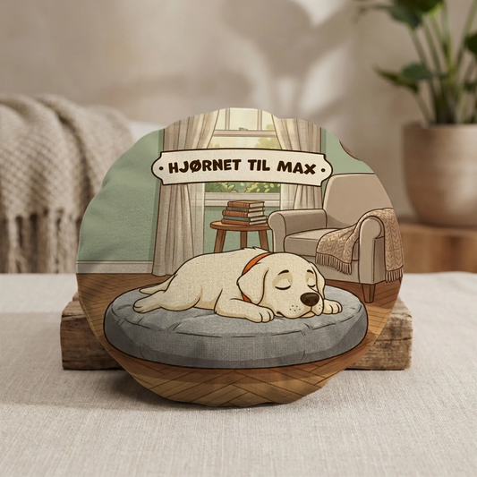 Personaliseret rund pude med sovende hund og teksten 'Hjørnet til Max'.