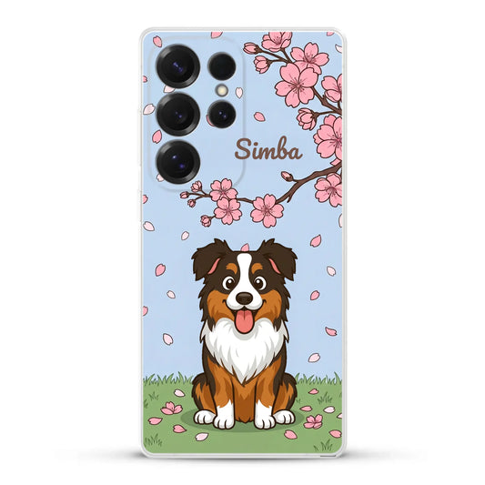 Personalized phone case featuring a joyful tri-color dog and "Simba" name under pink cherry blossoms, Japanese spring theme.