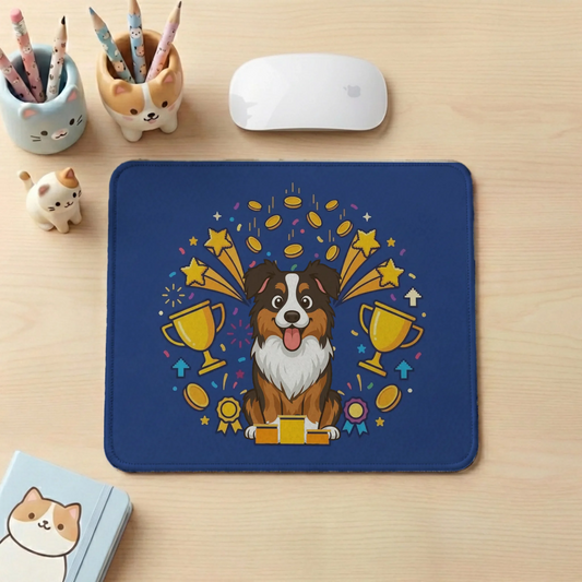 Personalized mouse pad for desk featuring a triumphant cartoon Australian Shepherd dog on a winner's podium with trophies and coins on a blue background, ready for your pet's name.