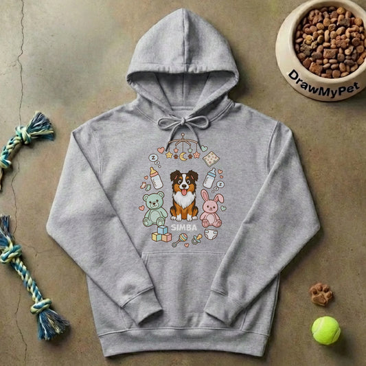 Personalized grey hoodie featuring a cartoon dog and baby items, celebrating a growing family.