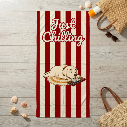 Personalized 'Just Chilling' beach towel with a sleeping cartoon dog illustration, red and cream stripes, perfect for pet owners.