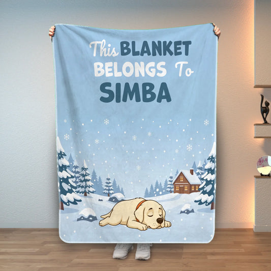 Personalized pet blanket with "This Blanket Belongs To [Name]" and a sleeping dog in a winter scene.
