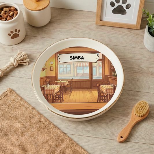 Personalized ceramic cat bowl with 'At the Restaurant' design and pet's name 'SIMBA'