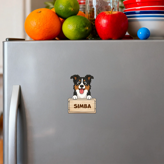 Personalized fridge magnet with happy cartoon dog holding 'SIMBA' name sign.