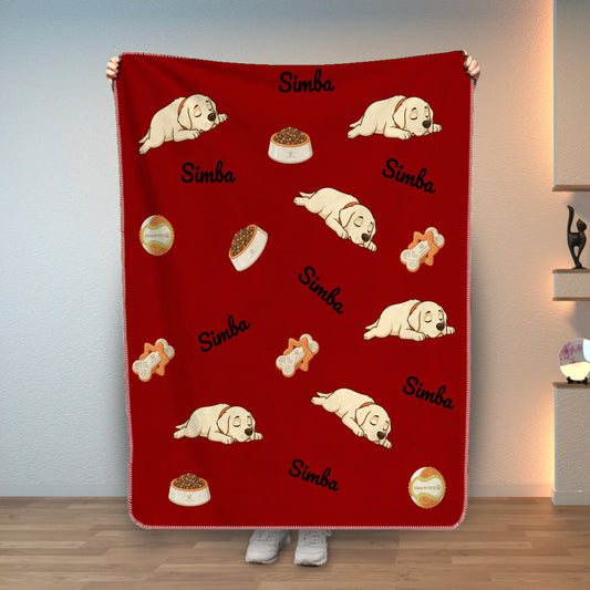 Personalized red pet blanket with sleeping Labrador puppies and pet's name 'Simba' repeated, held by a person.