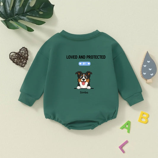 Personalized baby bodysuit in green featuring a cartoon dog and 'Loved and Protected By' slogan.