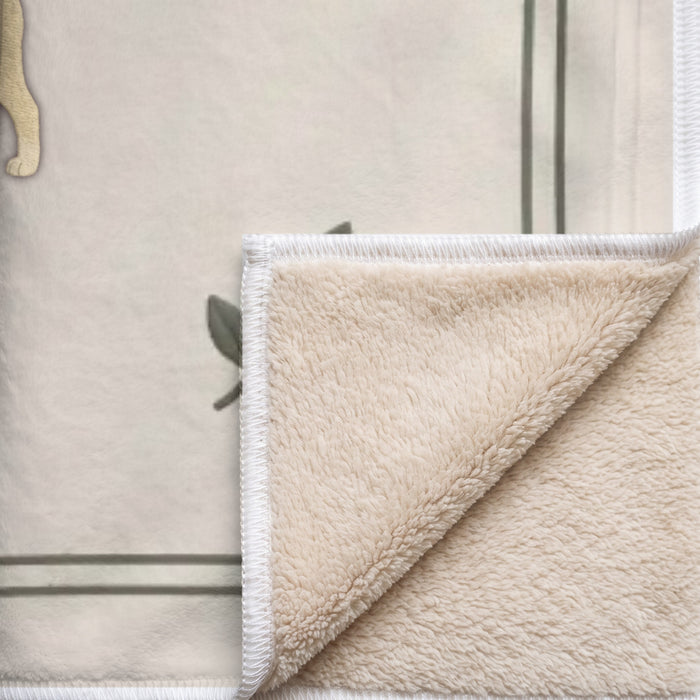 Coin replié du plaid Jardin secret : endroit imprimé, envers sherpa beige tout doux