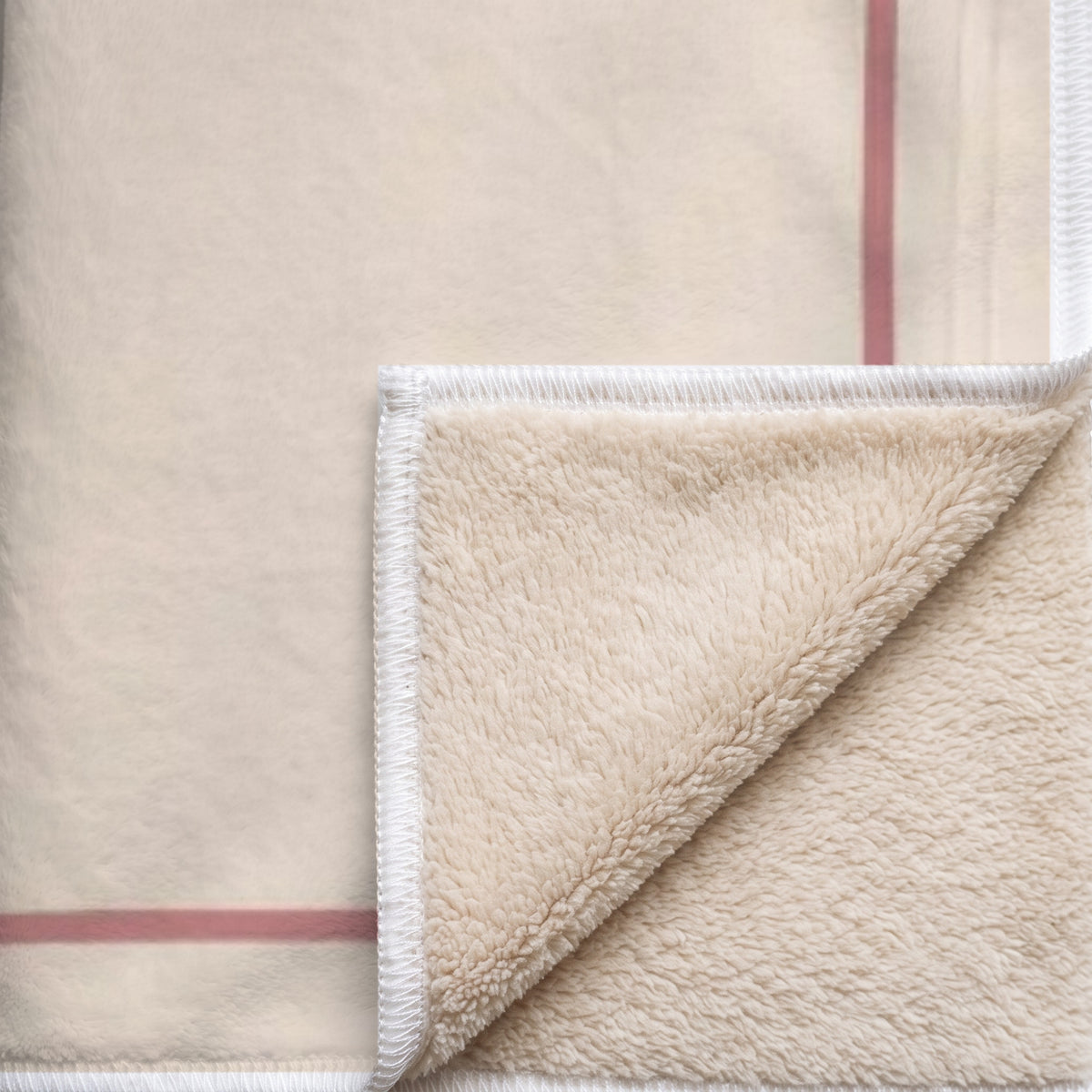 Coin replié du plaid Sieste avec lui : endroit imprimé, envers sherpa beige tout doux